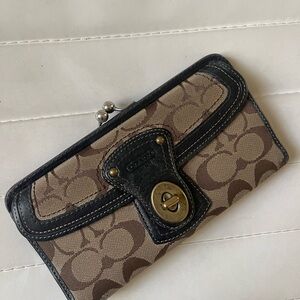 Coach Tan and Black Signature Wallet, lots of life left!